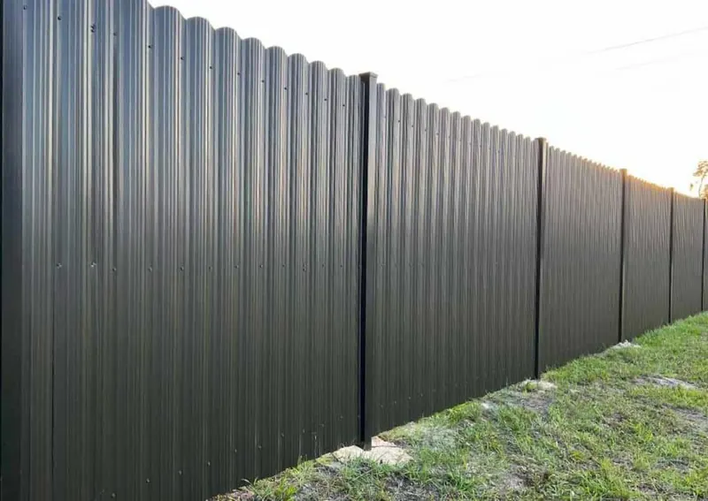 Black aluminum privacy fence with vertical pickets