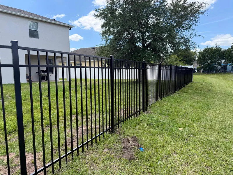 Black ornamental aluminum fence at a Central Florida residence