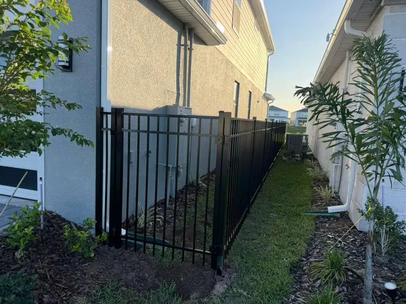 Black ornamental aluminum fence completed installation