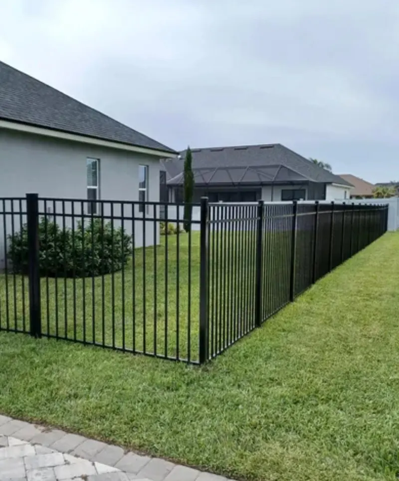 Black ornamental aluminum fence project completion