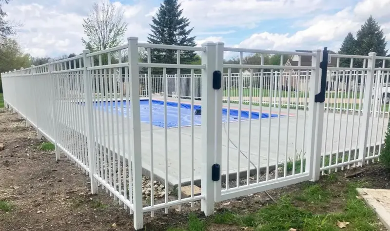 White aluminum ornamental fence at a Florida property