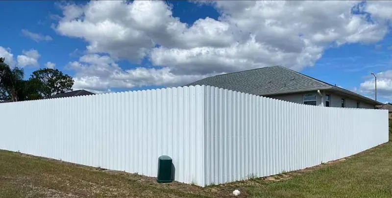White aluminum privacy fence completed installation