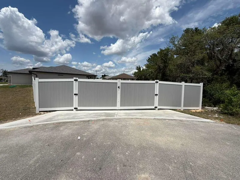 White vinyl privacy fence completed installation