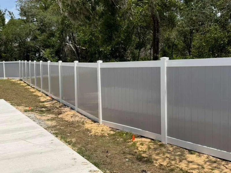 White vinyl privacy fence at a Florida residence