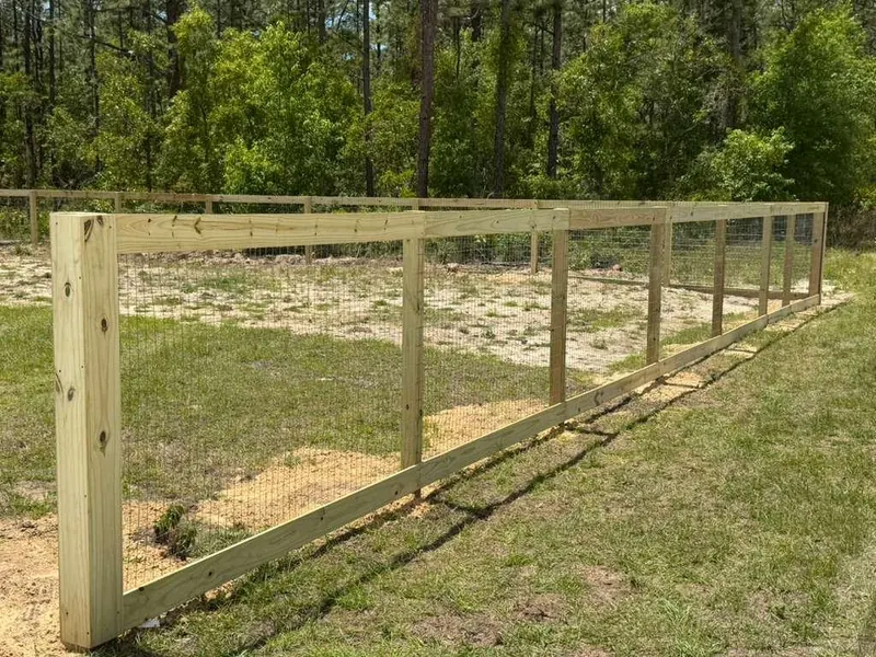 Wood privacy fence with new posts and pickets