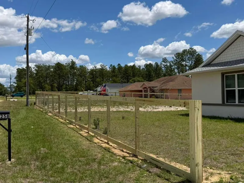Wood fence section in a Florida suburban yard