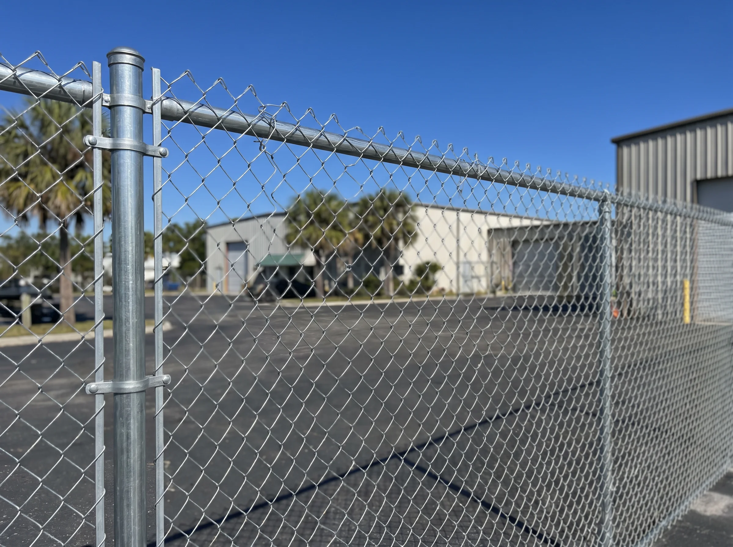 Galvanized chain-link fence around a commercial property in Florida